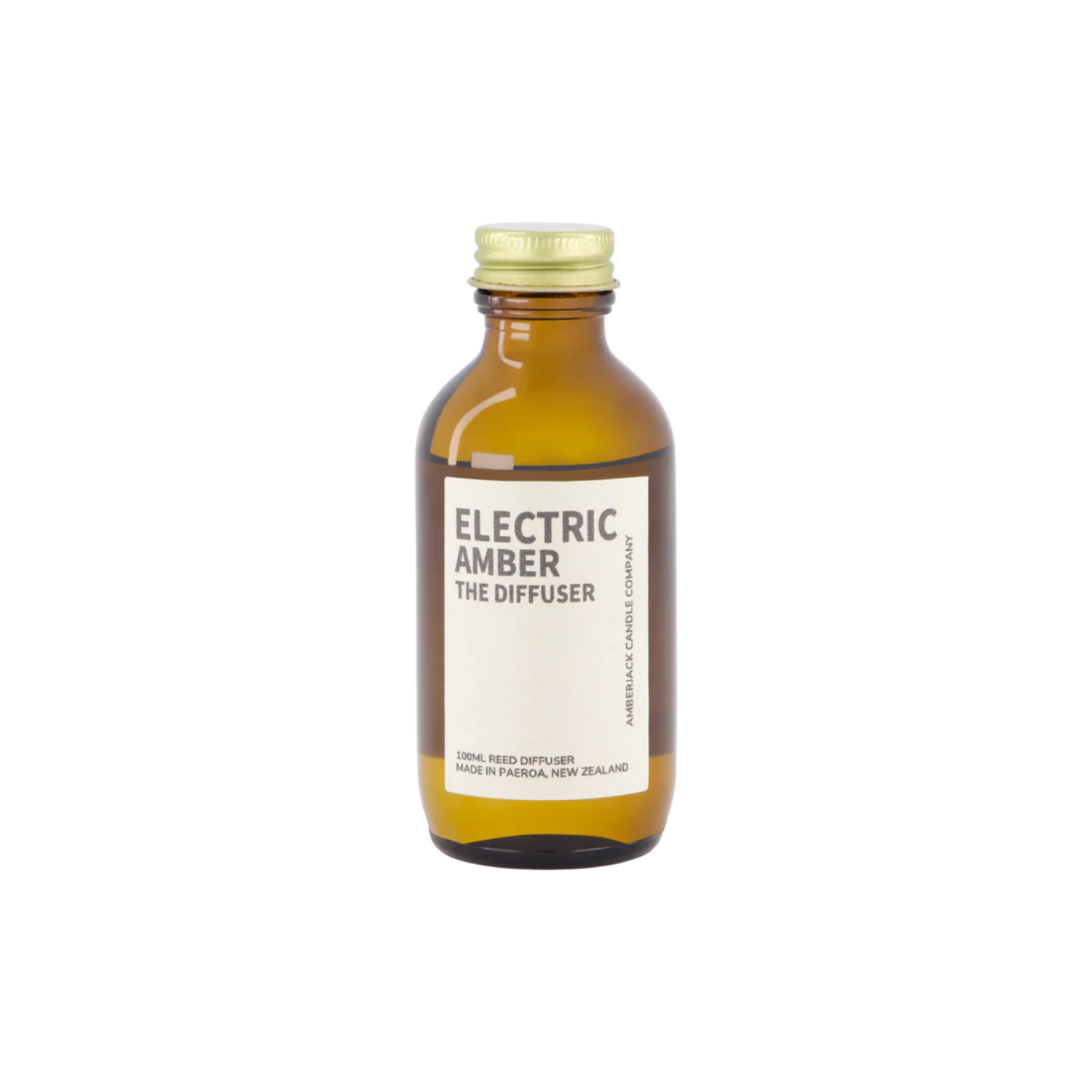 An amber bottle of Electric Amber scent as a reed diffuser. 